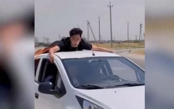 Узбекистанец в погоне за хайпом в TikTok прокатился на крыше автомобиля Spark 