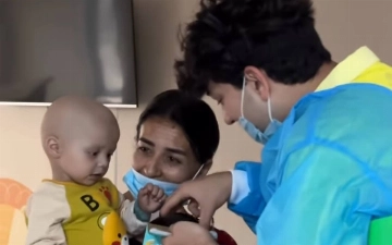 Озод Хурамов и Феруза Норматова посетили детский онкологический центр