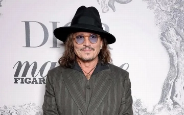 Джонни Депп навестил больных детей в Мадриде