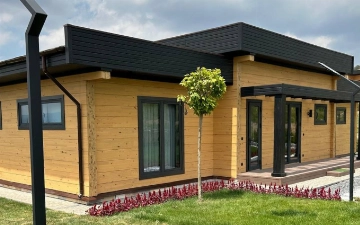 Узнацбанк приглашает инвесторов к сотрудничеству в проекте — коттеджи в стиле «Шале»