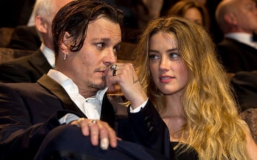 Эмбер Херд сообщила, что решила конфликт с Джонни Деппом 