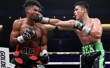 Боксер Бектемир Меликузиев одолел непобежденного Дариуса Фулгама