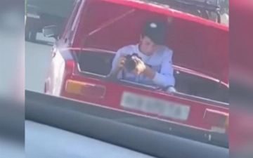 Житель Самаркандской области снимал свадебный кортеж, находясь в багажнике «Жигули» - видео