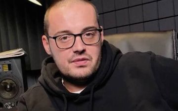 Гуф спровоцировал волну хейта из-за фотографии с ружьём после теракта в Казани - фото