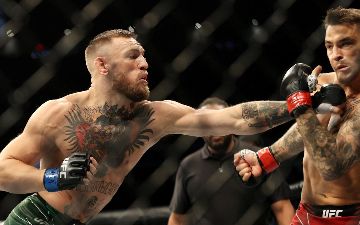 Макгрегор возобновил нападки на Порье и его жену