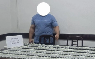В Намангане поймали мужчину, пытавшегося сбыть фальшивые $30 тысяч