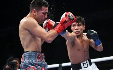 Муроджон Ахмадалиев защитил чемпионские пояса WBA и IBF — видео