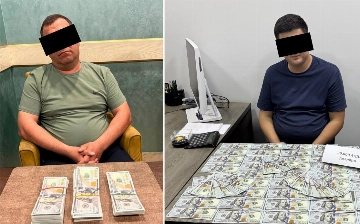 В Ташобласти двух правоохранителей поймали с крупными взятками
