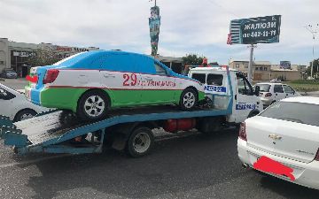 В Бухаре парень разъезжал на патриотично раскрашенном авто и временно лишился транспорта<br>