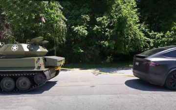 Это очень странно и интересно: Tesla Model X посоревновалась в перетягивании каната с танком – видео