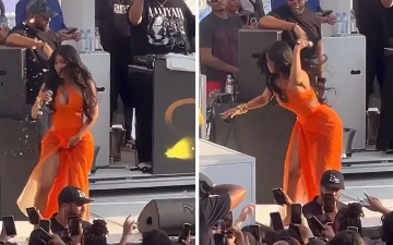 Карди Би просила облить ее водой перед броском микрофона в фанатку